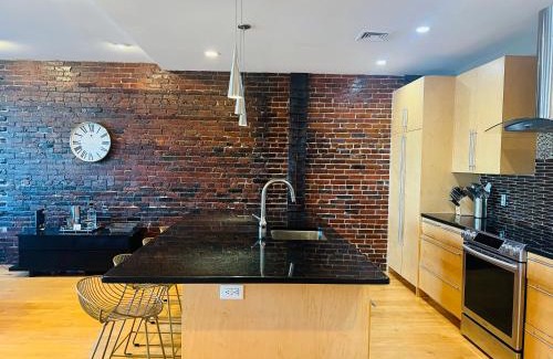 North End Apartment | Boston Harbor views Modern north end condo FREE PARKING!