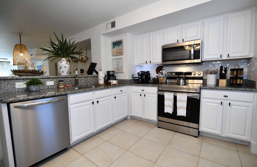 Rock Harbor House | Brand New Listing! Beautiful - Upscale newly remodeled Modern Tropical Oasis!