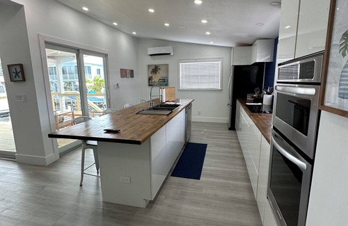 Sexton Cove Estates House | Brand New. Remodeled. Key Largo Home on Water