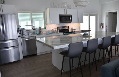 Bodden Town House | Breakers View Beach house perfect place to relax, unwind, sun, swim, snorkelntnn
