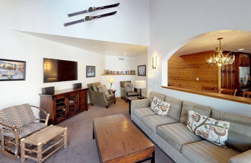 Vail Condo | Breathtaking views of Gore Creek from this 4 bdrm condo featuring a tastefully equipped kitchen/dining room, abundant natural light, private deck, and single car garage.
