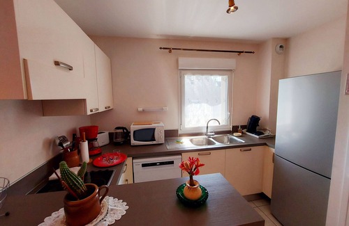 Mayenne Apartment | Bright 2-Bedroom Apartment with Balcony, Garage & Baby Equipment near Mayenne's Attractions