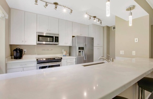 Hunt Club Condo | Bright Modern Condo at PGA National Resort