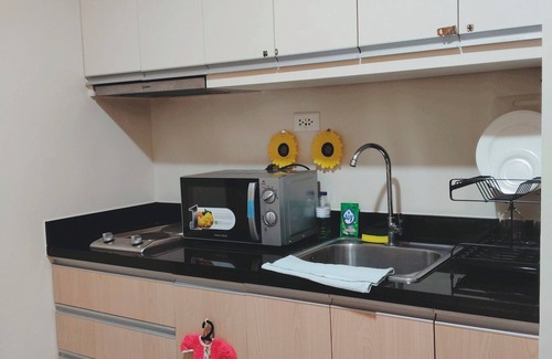 Iloilo Condo | Bright Retreat Blending Style and Comfort