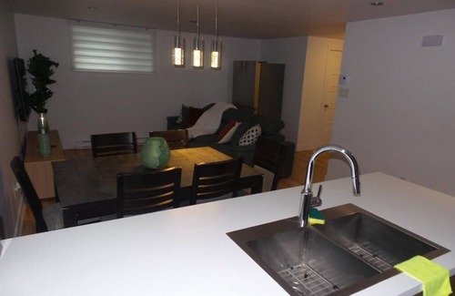 Mirabel Apartment | Bright room in a 3 and a half with sofa bed to rent for your stays