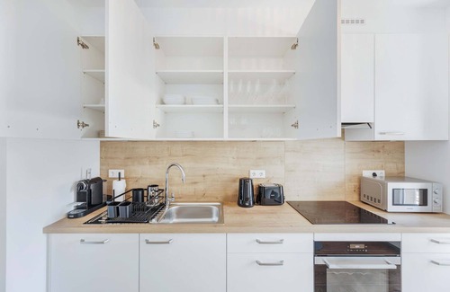 Gare Apartment | Bright & Stylish 2BR Apt in City Center