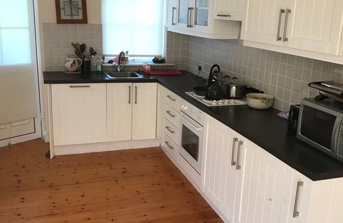 Brittas Bay House | Brittas Bay. Detached house with large deck and garden sleeps six