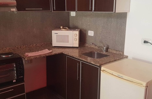 Moreno Apartment | brown apartment complex