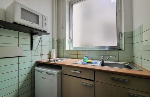 Amandus - Atheneum Apartment | Budget Flats Antwerpen