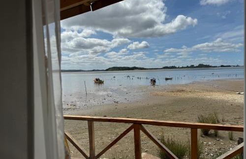 Maullin House | Cabañas y Tinajas Rio Quenuir