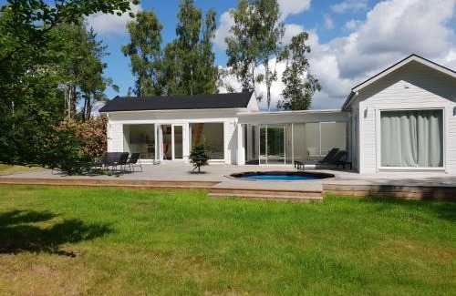 Vastra Torup House | Cabin in the forest with Spa bath