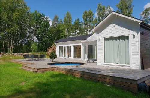 Vastra Torup House | Cabin in the forest with Spa bath