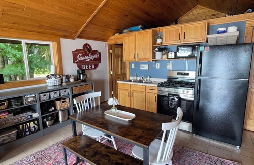 Cable Cabin | Cabin right on the water! All bikers, skiers, fisherman and more welcome!