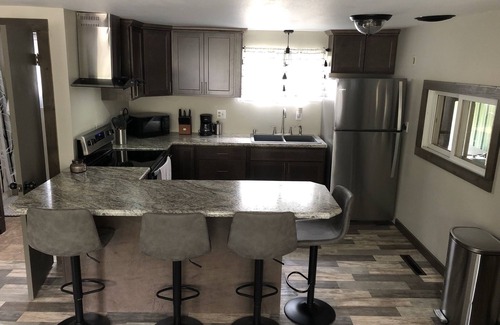 Ingalls House | Cabin with bar area and pool table-located in Stephenson, MI