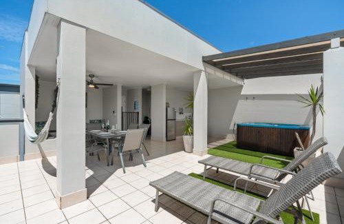 Cairns Apartment | Cairns Penthouse - Private Rooftop Outdoor Gym, Spa & TV Area with Sunset & Mountain Views