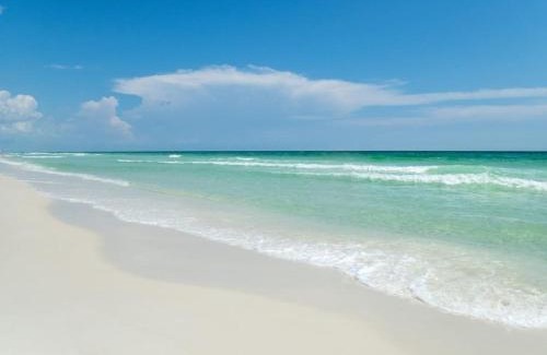 Panama City Beach House | Calypso 3 New Relax Unwind Luxury PCB next to Pier Park 3 Bed 2 Bath Pool Hot Tub Tikki bar