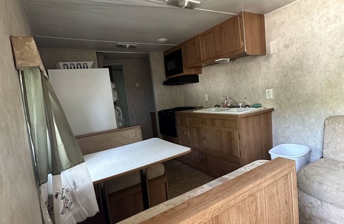 Glouster House | Camper located in the heart of Burr Oak State Park