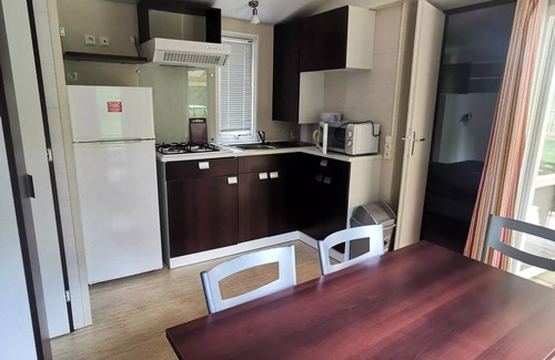 Ucel House | Camping Ushuaïa Villages les Pins d'Ucel * - HIRONDELLE - mobile home 28 m² + TV for 5 to 6 people - 5 people. included in the price