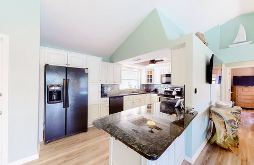 Charlotte Park House | Canal-front home with private dock, pool, screened lanai, & W/D