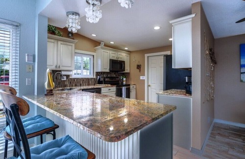 Bayshore Gardens House | CANAL FRONT W/DOCK, Water View, Dock your Boat, Free WIFI Dog - See Note.