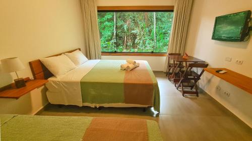 Barra da Lagoa Cabin | Canto dos Pássaros Suítes