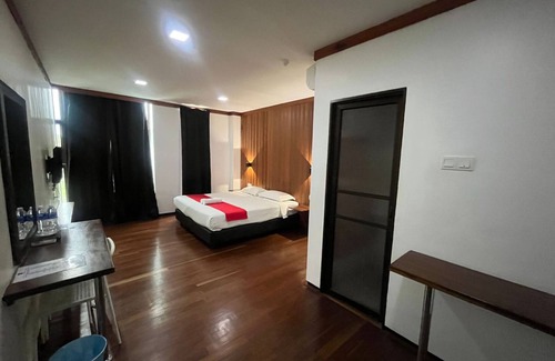 Slim River Hotel | Capital O 89333 Musse Hotel
