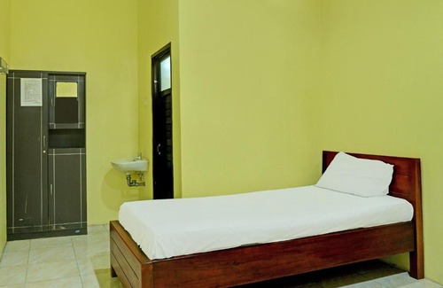 South Ogan Komering Ulu Hotel | Capital O 92316 Wisma Widya Loka Pratama Near Futsal Tebing Gading