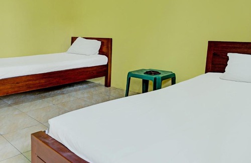 South Ogan Komering Ulu Hotel | Capital O 92316 Wisma Widya Loka Pratama Near Futsal Tebing Gading
