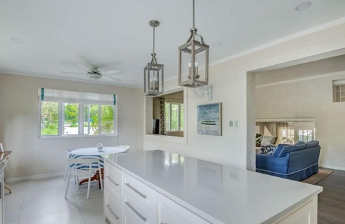 Douglas House | Capri Manor, Young Estates · Stunning Luxury Beachfront Villa