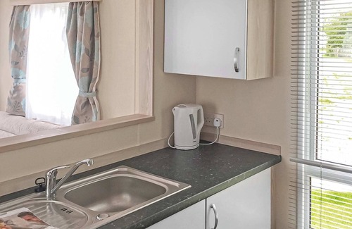 Chapel Saint Leonards House | Caravan with one double and one twin.