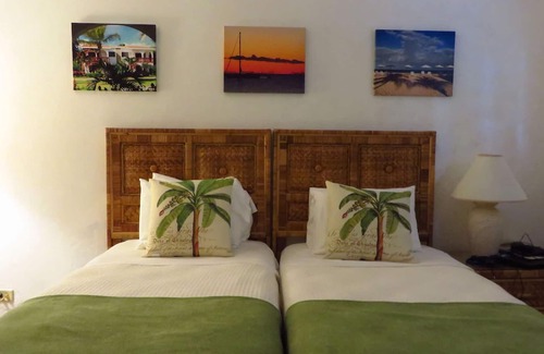 West End Village Hotel | Caribbean Getaway | Room w/Full Kitchen & Patio | Steps Away from the Beach