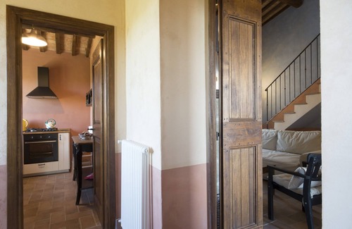 Commenda Apartment | Casa Cristoforo, four rooms plus, with fireplace and terrace on the olive grove