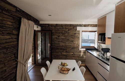Bomfim House | Casa de Xisto - A cozy house surrounded by the vineyard terraces of the Douro.
