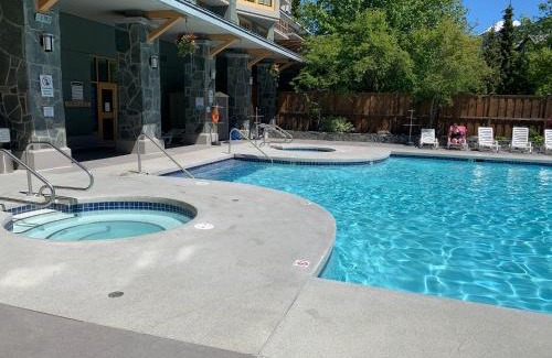 Village North Hotel | Cascade Lodge suite WIFI 2 hot tubs pool gym sauna bike and ski storage room