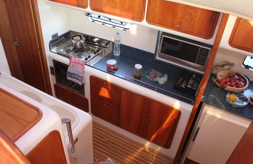 Ornos Boat Rental | Catamaran with skipper and hostess Cyclades