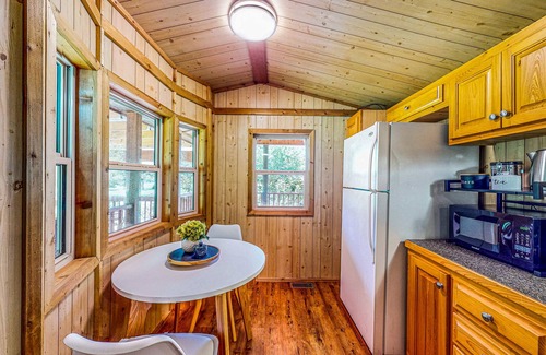 Waller Cabin | Cedar cabin with pretty pond, beach, swimming deck & tropical hut/bar