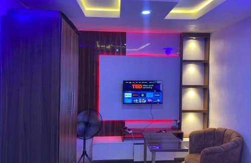 Abeokuta Apartment | Cee&Tee ABK 1BEDROOM -247Electricity - Solar Inverter AC in bedroom