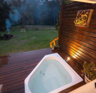 Matcham Ski Chalet | Central Coast Deck and Spa Luxury Tiny House with firepit