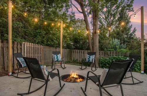 West Omaha House | Central Family Oasis with Hot Tub & Fenced Yard