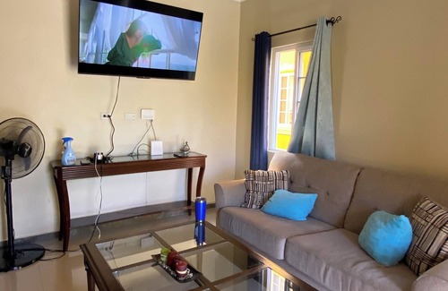 Runaway Bay Apartment | Central located apartment. Beach, pool and parking access. Pet friendly