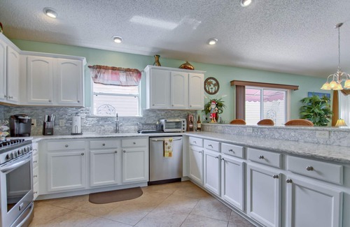 Mallory Square House | Centrally Located Pool Home with Golf Cart near Lake Sumter Landing!