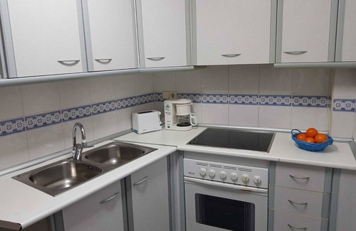 Valdepenas Condo | CHANNEL FLOOR IN FULL CENTER.