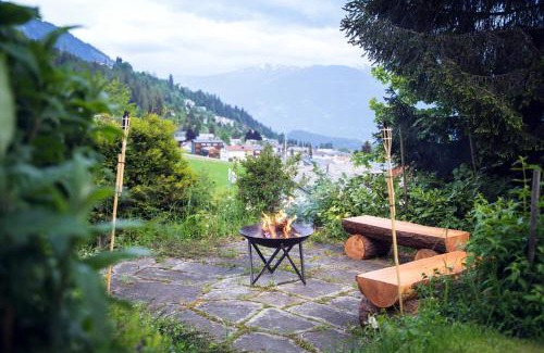 Flims Apartment | Charmantes Apartment mit grossem Garten .Kids4free.
