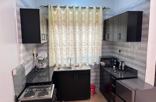 Kampala Apartment | Charming 1-bedroom apartment along Entebbe road Namasuba with WiFi