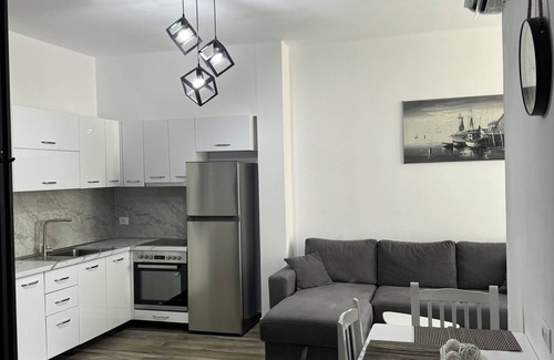 Kamez Apartment | Charming 1-bedroom in Bathore with AC, Wi-Fi, parking, and car rentals.