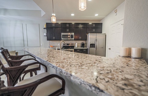 Biggar House | Charming 2-bedroom townhome with AC, WiFi in tranquil Fort Myers