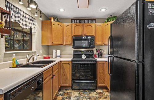 Chalet Village Cabin | *Charming 2BD Retreat! HOT TUB + Game Room!*