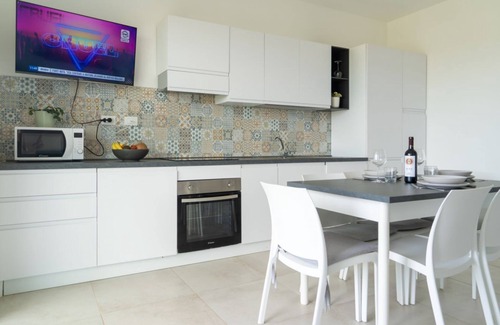 Pachino Apartment | Charming 75 sqm seaview apartment on two levels, for 5 people, located inside the renowned Borgo 84 residence, equipped with swimming pool and cycle path. The property is located just 3 km from the center of Marzamemi, one of the most fascinating seaside
