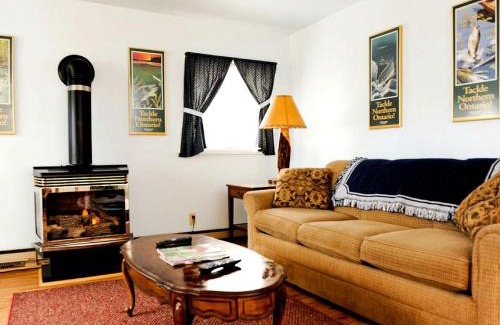 West Branch House | Charming Cabin Rental for the Perfect Summer Getaway on Clear Lake in Michigan