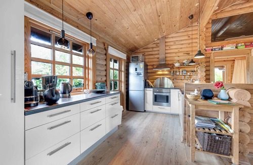 Hoeve Strand House | Charming cabin with wilderness hot tub